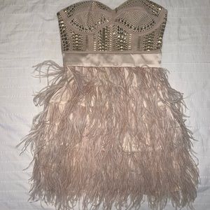Nude feather & stud mini dress